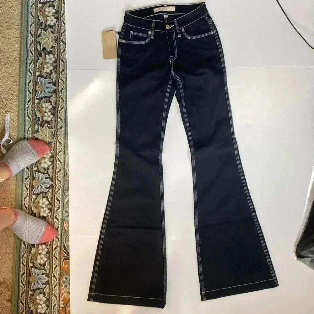 Burberry Brit NWT Black with White Stitching
Denim Flare Leg Jeans Size 25